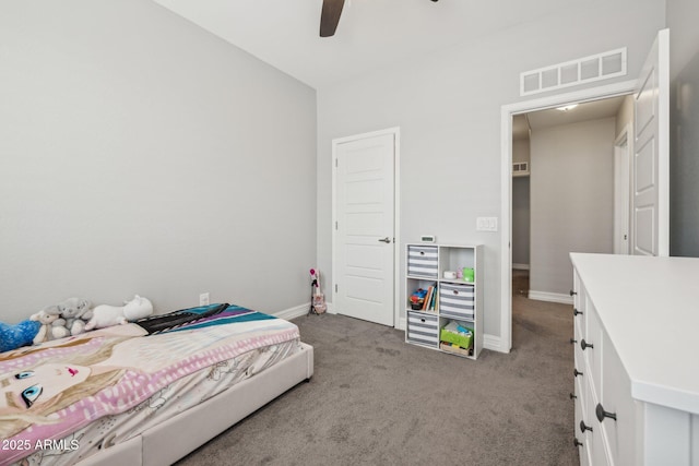 bedroom featuring light carpet and ceiling fan