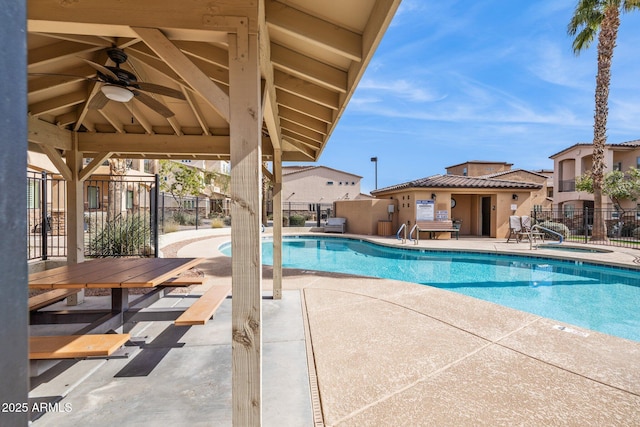 view of swimming pool with a gazebo, a patio area, and ceiling fan