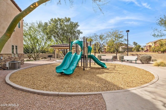 view of jungle gym featuring central AC unit