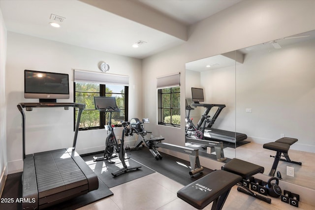 exercise area featuring visible vents, recessed lighting, and baseboards