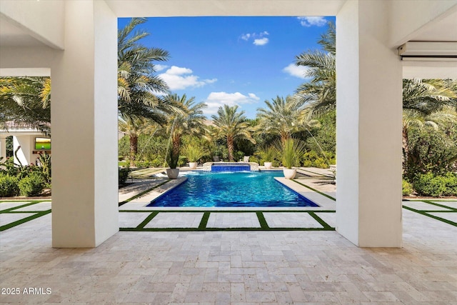 outdoor pool with a patio