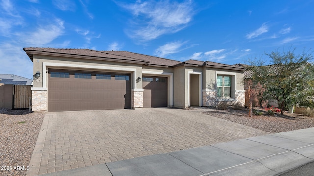 prairie-style house featuring a garage