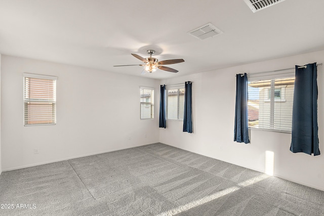 1255 N Banning, Mesa, AZ 85205 - carpeted spare room with baseboards, ceiling fan, and visible vents
