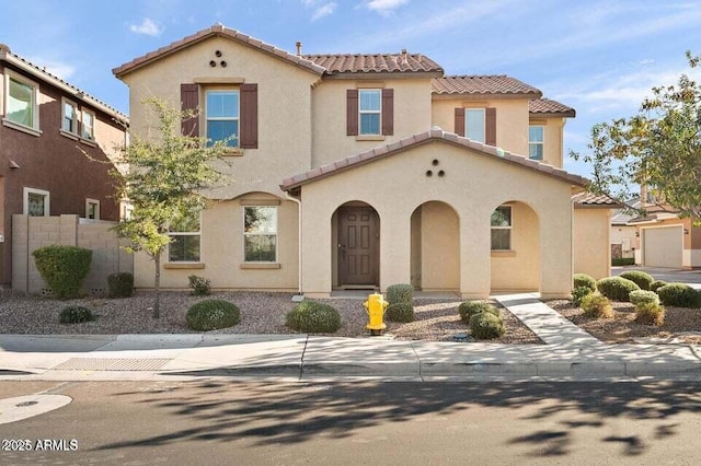 1255 N Banning, Mesa, AZ 85205 - mediterranean / spanish-style house with a tile roof, fence, and stucco siding