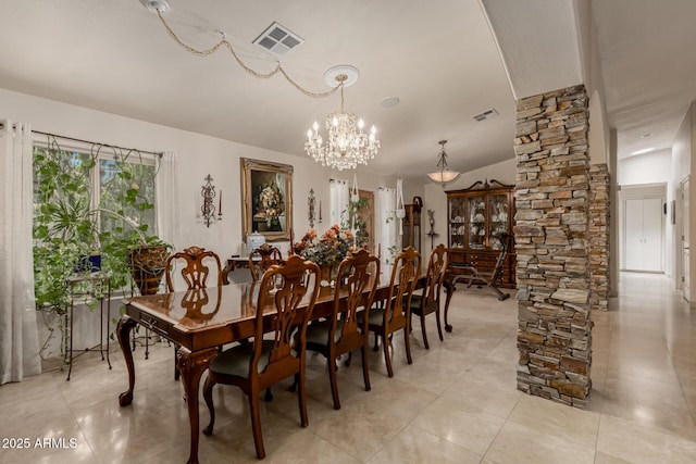12837 N 68th St, Scottsdale, AZ 85254 - dining space with a chandelier and light tile patterned floors