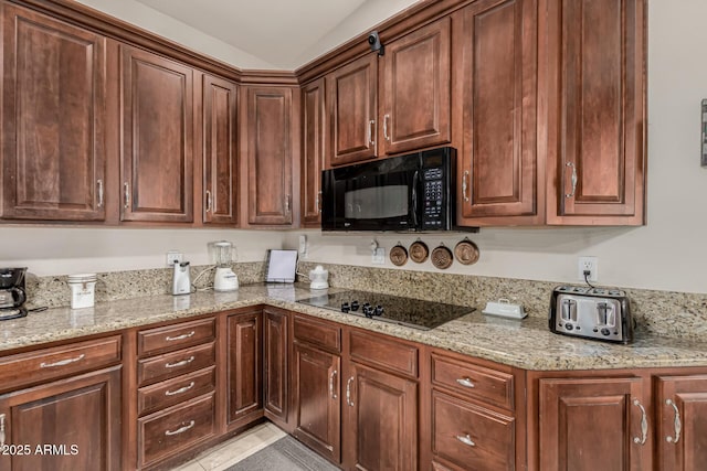 12837 N 68th St, Scottsdale, AZ 85254 - kitchen featuring black appliances and light stone counters