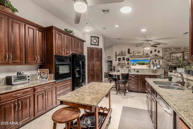 12837 N 68th St, Scottsdale, AZ 85254 - kitchen featuring ceiling fan, black appliances, a sink, light stone counters, and recessed lighting