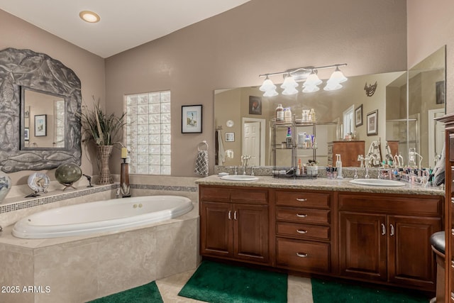 12837 N 68th St, Scottsdale, AZ 85254 - bathroom featuring a garden tub, double vanity, and tile patterned flooring
