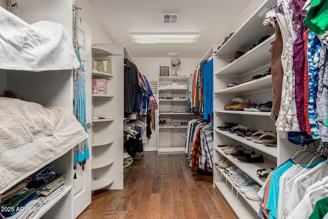 12837 N 68th St, Scottsdale, AZ 85254 - spacious closet featuring hardwood / wood-style floors