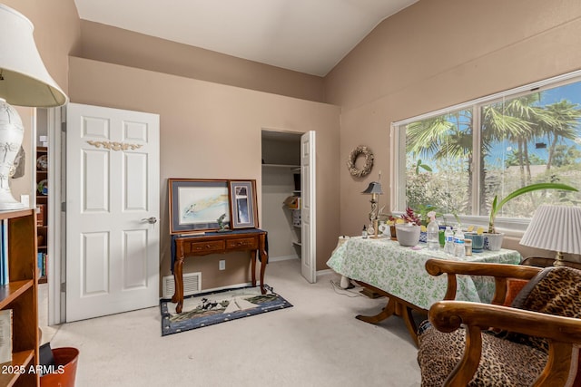 12837 N 68th St, Scottsdale, AZ 85254 - dining room featuring vaulted ceiling and light carpet