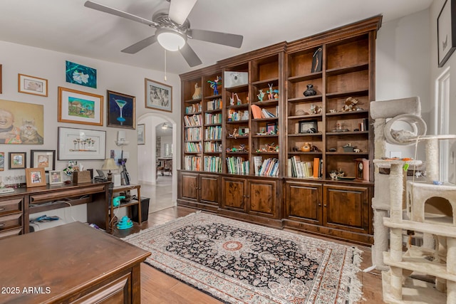 12837 N 68th St, Scottsdale, AZ 85254 - office with arched walkways, a ceiling fan, and wood finished floors