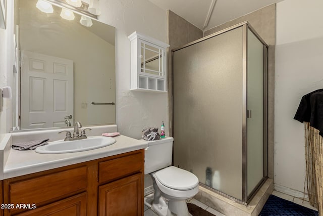 12837 N 68th St, Scottsdale, AZ 85254 - full bathroom featuring vanity, a shower stall, tile patterned floors, and toilet