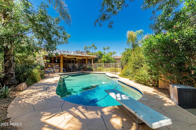 12837 N 68th St, Scottsdale, AZ 85254 - view of pool featuring a diving board and a patio