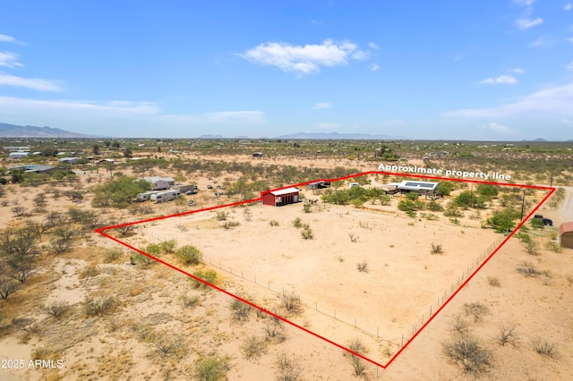 8730 E Barataria Blvd, Sierra Vista, AZ 85650 - aerial view of sparsely populated area with a desert landscape, property boundaries highlighted, and a mountain backdrop
