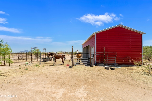 8730 E Barataria Blvd, Sierra Vista, AZ 85650 - view of yard featuring an exterior structure, an outbuilding, and a view of rural / pastoral area