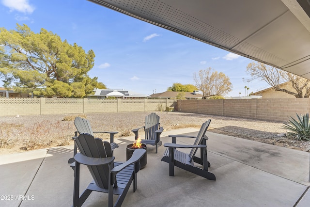 view of patio featuring an outdoor fire pit