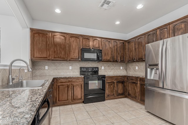 28232 N Abby Cir, San Tan Valley, AZ 85143 - kitchen featuring black appliances, a sink, tasteful backsplash, light tile patterned floors, and recessed lighting