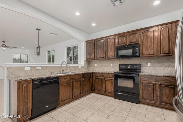 28232 N Abby Cir, San Tan Valley, AZ 85143 - kitchen with black appliances, a sink, a peninsula, backsplash, and recessed lighting