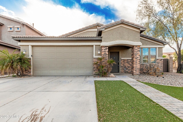 28232 N Abby Cir, San Tan Valley, AZ 85143 - view of front of home with stucco siding, a garage, concrete driveway, and a front yard