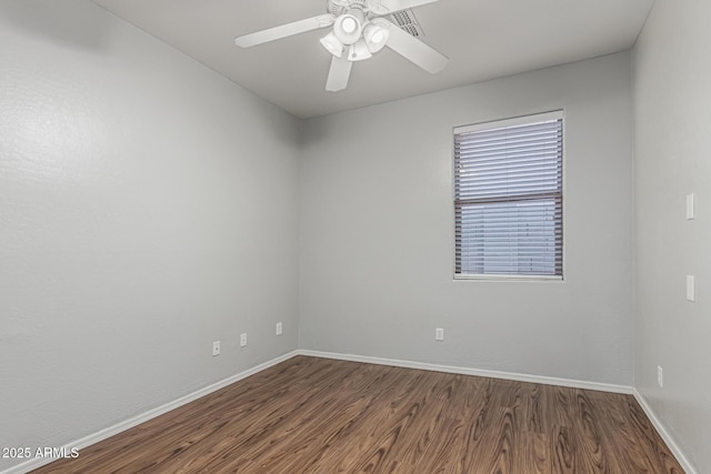 28232 N Abby Cir, San Tan Valley, AZ 85143 - empty room with dark wood-style flooring, baseboards, and ceiling fan