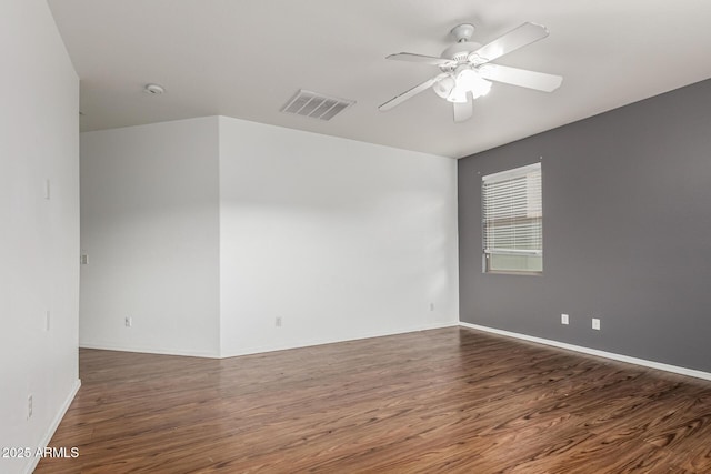 28232 N Abby Cir, San Tan Valley, AZ 85143 - unfurnished room featuring wood finished floors, ceiling fan, and baseboards