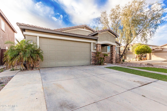 28232 N Abby Cir, San Tan Valley, AZ 85143 - mediterranean / spanish home with concrete driveway, stucco siding, an attached garage, a tile roof, and stone siding