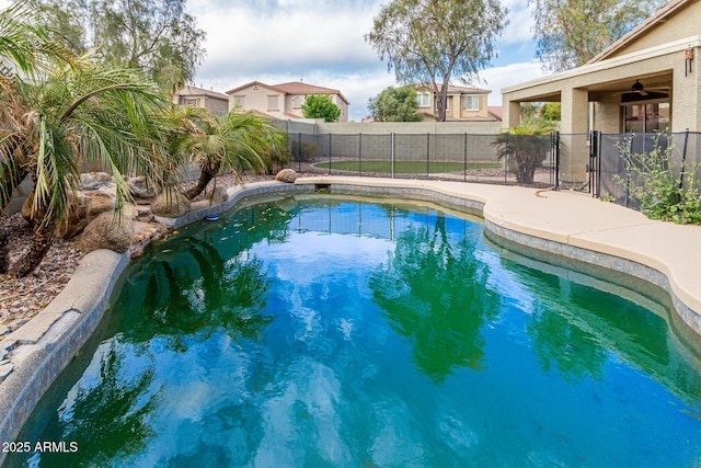 28232 N Abby Cir, San Tan Valley, AZ 85143 - view of swimming pool featuring a fenced backyard and ceiling fan
