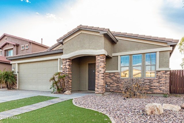 28232 N Abby Cir, San Tan Valley, AZ 85143 - view of front of home featuring an attached garage, stucco siding, driveway, and fence