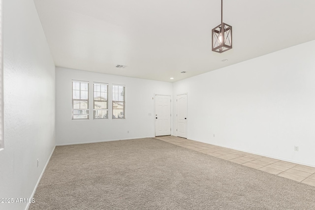 28232 N Abby Cir, San Tan Valley, AZ 85143 - unfurnished room with light carpet, light tile patterned floors, and baseboards