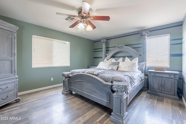 21188 N Duncan Dr, Maricopa, AZ 85138 - bedroom with hardwood / wood-style flooring, baseboards, and a ceiling fan