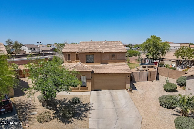 21188 N Duncan Dr, Maricopa, AZ 85138 - mediterranean / spanish-style house with stucco siding, a tile roof, fence, and concrete driveway