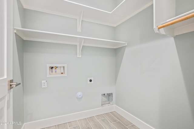 laundry area featuring gas dryer hookup, washer hookup, and hookup for an electric dryer