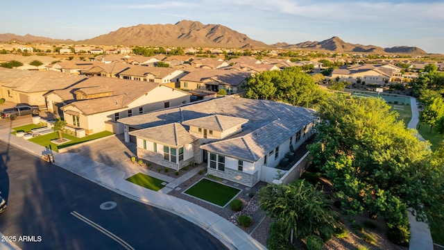 bird's eye view featuring a residential view and a mountain view