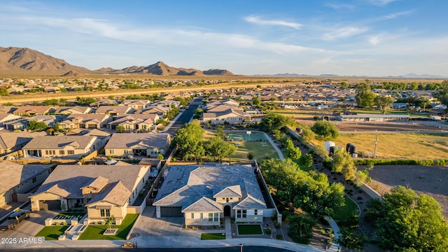 birds eye view of property featuring a residential view and a mountain view