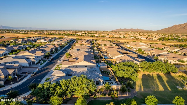 drone / aerial view with a residential view and a mountain view