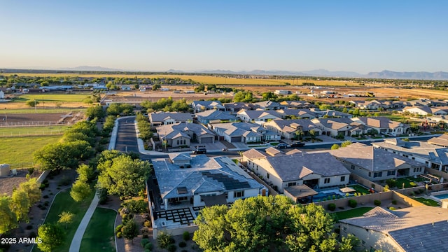 birds eye view of property with a residential view and a mountain view