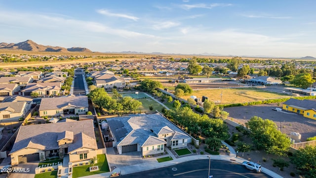 birds eye view of property with a residential view and a mountain view