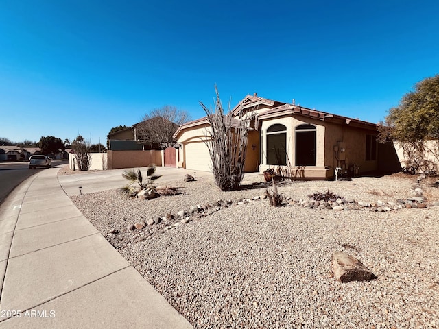 view of front of home featuring a garage