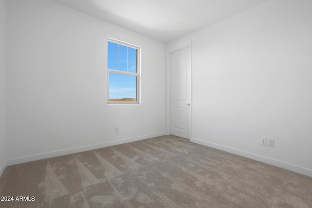 spare room with carpet flooring