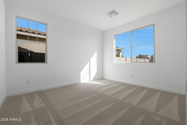 view of carpeted spare room