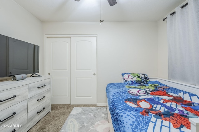 2717 W Bowker St, Phoenix, AZ 85041 - bedroom with carpet floors, a ceiling fan, and a closet
