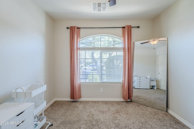 2717 W Bowker St, Phoenix, AZ 85041 - carpeted empty room with plenty of natural light and ceiling fan