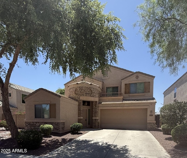 21280 N 96th Ave, Peoria, AZ 85382 - view of front facade featuring stone siding, stucco siding, concrete driveway, and an attached garage