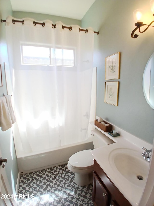 full bathroom with tile patterned floors, shower / bathtub combination, vanity, and toilet