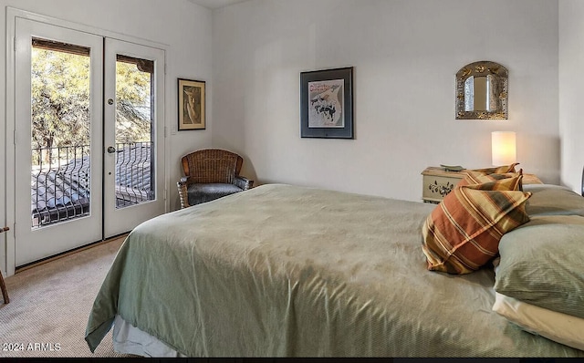 bedroom with carpet, french doors, and access to exterior