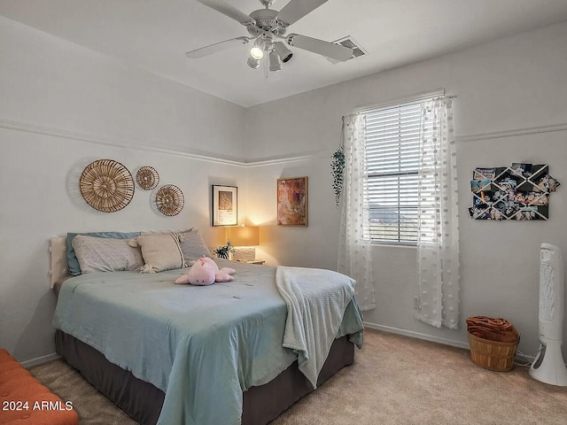 bedroom featuring ceiling fan and carpet flooring