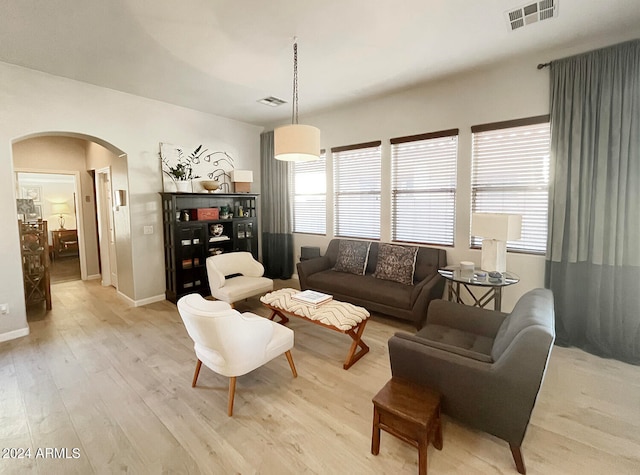 living room with light hardwood / wood-style floors