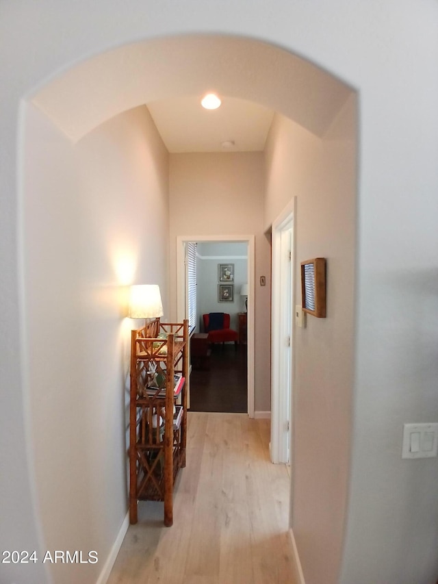 hall with light hardwood / wood-style floors