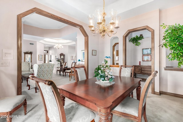 dining room featuring light colored carpet