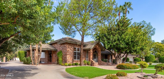 view of front of property with a front yard